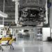 Industrial robots working collaboratively in a factory, enhanced by AI technology.