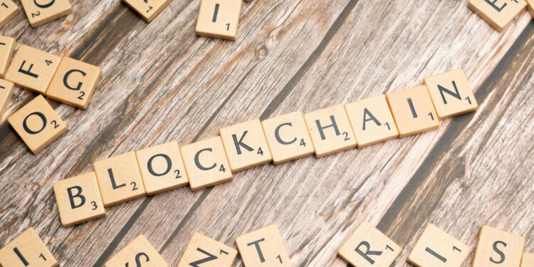 A digital representation of a blockchain ledger with tokenized fund symbols.