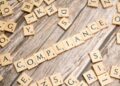 A regulatory meeting on stablecoin compliance with financial officials discussing measures.