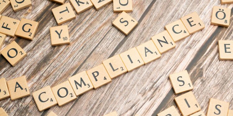A regulatory meeting on stablecoin compliance with financial officials discussing measures.