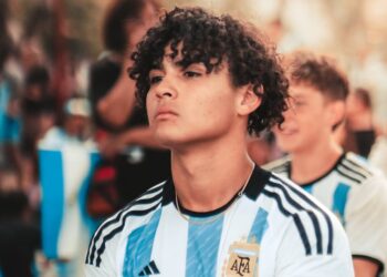 Nexo logo displayed alongside Argentina's national team jersey in promotional event.