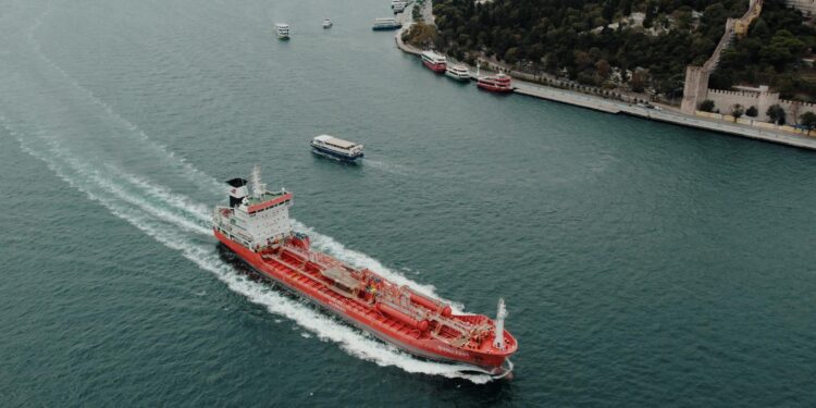 Chinese tanker navigating through the Strait of Hormuz, evading U.S. naval blockade.