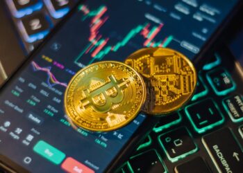 Users engaging with a digital prediction market platform on crypto and finance.