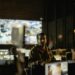 Military personnel monitor a Bitcoin node on screens in a command center.
