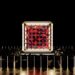 A digital representation of a blockchain with quantum symbols and security seals.