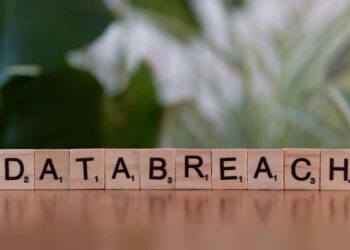 Cybersecurity team analyzing data breach related to cryptocurrency theft.