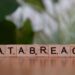 Cybersecurity team analyzing data breach related to cryptocurrency theft.