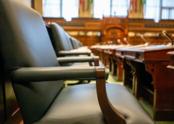 Senate Banking Committee members discuss Kevin Warsh's nomination for Fed Chair during a hearing.