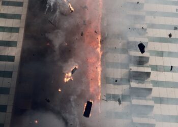 Fire and smoke billowing from a damaged oil pipeline in Saudi Arabia amid escalating regional tensions.