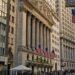Traders look concerned at the New York Stock Exchange as markets drop significantly.
