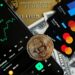 Shinhan Card and Solana logos with digital currency symbols and a financial chart backdrop.