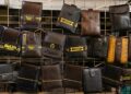 Counterfeit Ledger wallets displayed on a Chinese marketplace with warning signs highlighted.