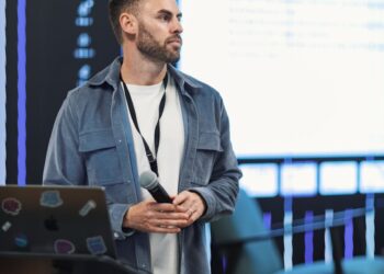 Chris Giancarlo speaking at a conference about digital assets and regulatory frameworks.
