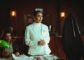 Musk and legal team in courtroom, discussing OpenAI funding and contributions.