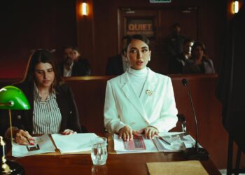 A courtroom scene with lawyers discussing AI legal implications and regulations.