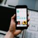 A smartphone displaying a fake Instagram account claiming to be Ripple's CEO.
