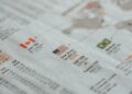 Polymarket logo overlaid on a financial news backdrop, highlighting regulatory updates.