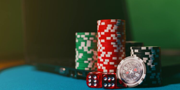 Gavel and scales of justice against a backdrop of gambling chips and online betting logos.