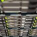 Data center with high-performance servers, symbolizing AI compute expansion.