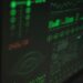 A Binance security team member monitoring systems, emphasizing user safety amid data breaches.