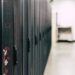 Technicians inspect advanced AI computing servers in a high-tech facility in China.