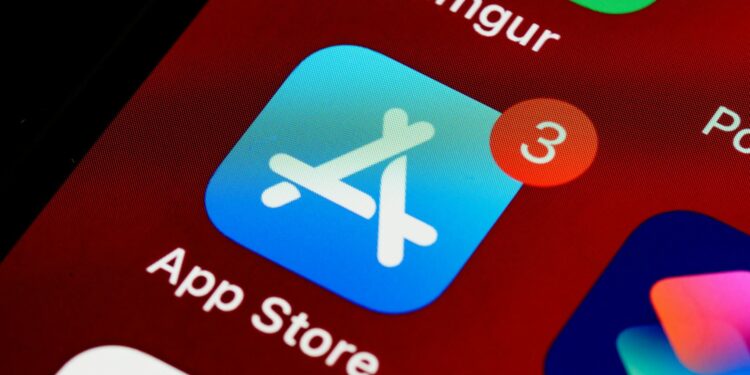 A smartphone screen displaying Bitchat app being removed from an app store interface.
