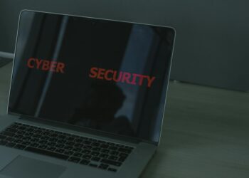 A computer screen displaying a cybersecurity alert about crypto malware and the Obsidian app.