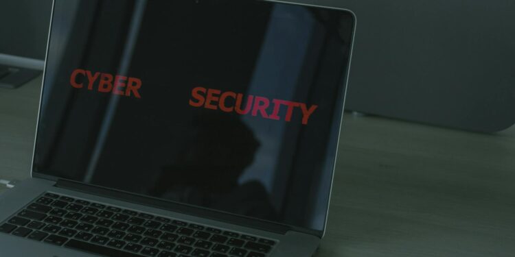 A computer screen displaying a cybersecurity alert about crypto malware and the Obsidian app.