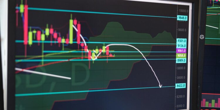 Multiple screens displaying financial charts with crypto symbols, reflecting market reactions.