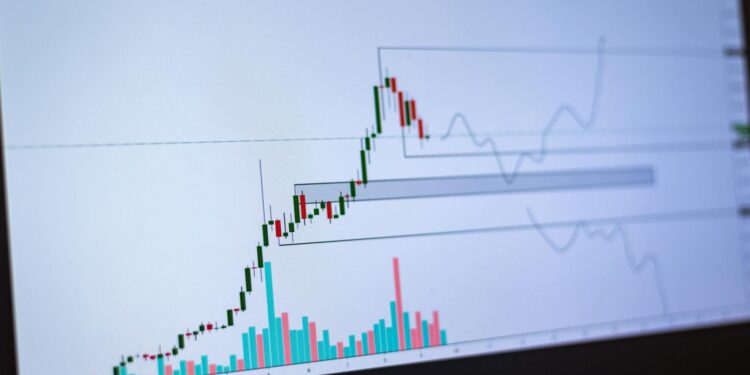 Traders monitor Bitcoin's price decline on a digital trading platform.