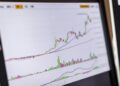 A graph showing rising yield-bearing stablecoin market trends and regulatory concerns.