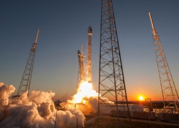 SpaceX rocket launch with a digital overlay of financial charts and IPO announcements