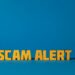 Graphic warning icon with a digital lock and phishing alert in a crypto context.
