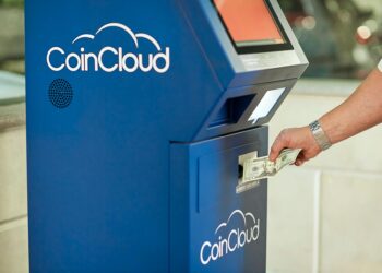 Crypto ATM with a warning label about new Tennessee regulations on compliance.