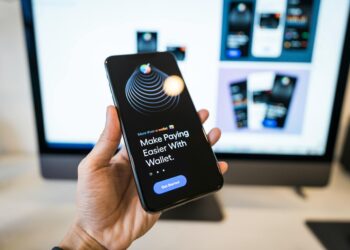 A smartphone displaying Tether's new self-custodial wallet interface with cloud backup options.