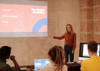 A Google Cloud executive presenting the new AI fund initiative at a tech conference.