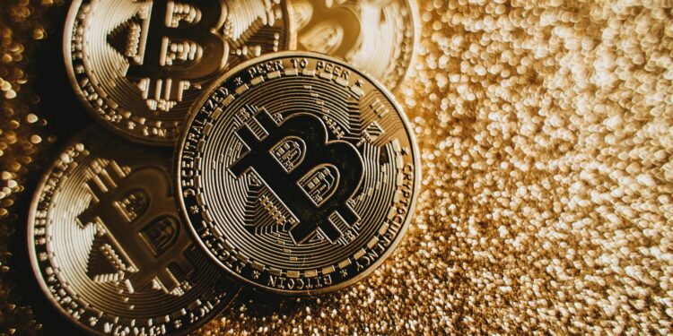 Bitcoin and gold coins intertwined on a digital background symbolizing COINSOV Index launch.