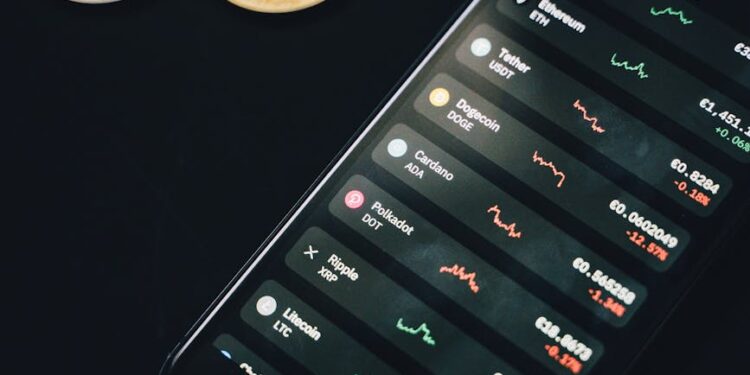 A warning sign with a phishing hook and a smartphone displaying cryptocurrency apps.