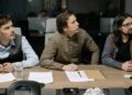 Ripple and Kyobo Life representatives discuss blockchain bond project at a conference table.