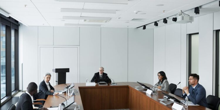 Ripple and Kyobo Life executives discuss the tokenized bond pilot in a conference room setting.