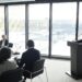 Nvidia CEO speaks at a podium, discussing AI and underreported data centers in China.