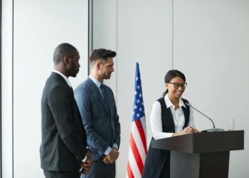 SEC Chair Paul Atkins speaking at a podium about crypto regulation strategy.
