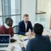 Investors discuss stablecoin strategies at a financial conference, highlighting Tether's support.