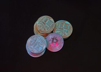 A digital representation of Bitcoin coins stacked, symbolizing Metaplanet's crypto acquisition.