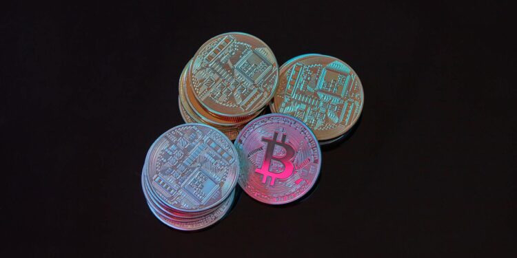 A digital representation of Bitcoin coins stacked, symbolizing Metaplanet's crypto acquisition.