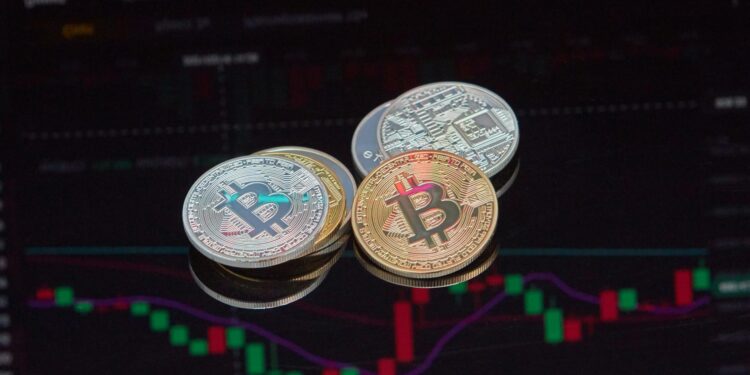 Bitcoin coins on a digital interface, reflecting market fluctuations amid regulatory discussions.
