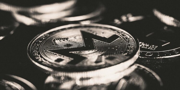 Securitize and TRON logos intertwined with digital asset icons on a tech background.