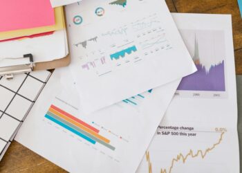 A visual representation of stablecoins with financial graphs and regulatory documents.
