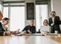 OpenAI team meeting with TBPN executives to discuss AI development strategies.