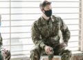 U.S. Army sergeant at a court hearing discussing insider trading allegations.